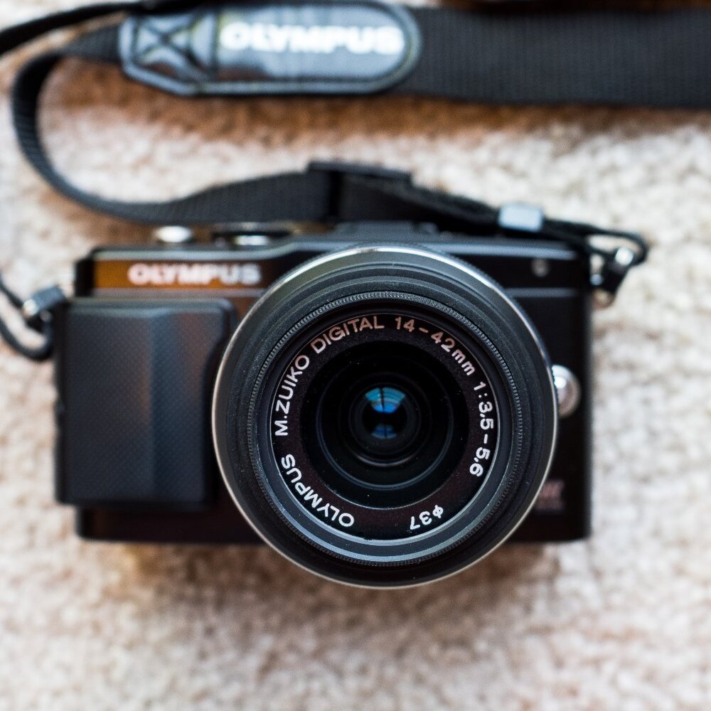 Olympus PEN Mirrorless Camera and Lens